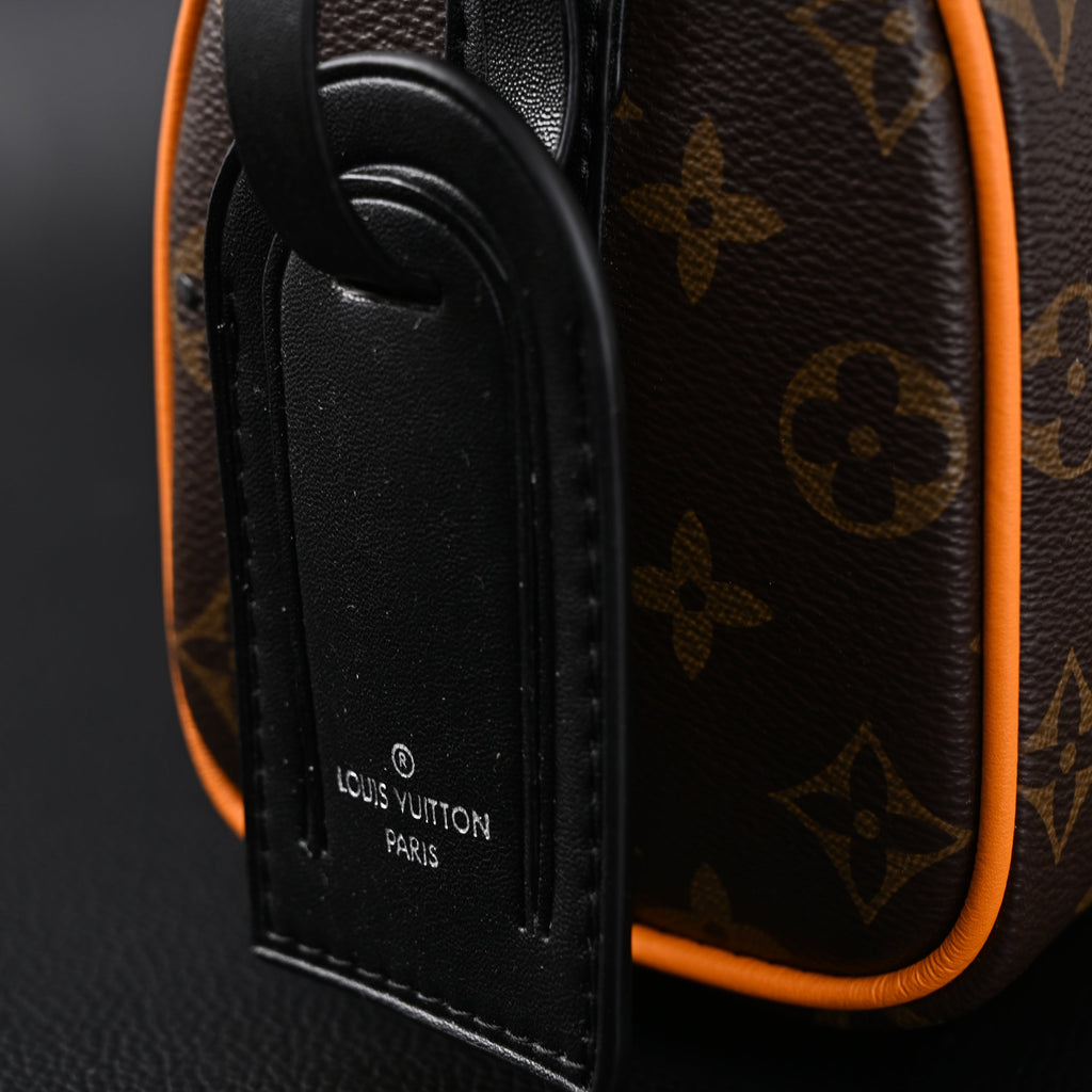 Louis Vuitton Keepall Bandoulière 50 – Monogram Canvas with Neon Orange Trim