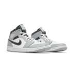 Angled front view of a full pair of Air Jordan 1