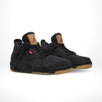 Angled front view of a full pair of Air Jordan 4
