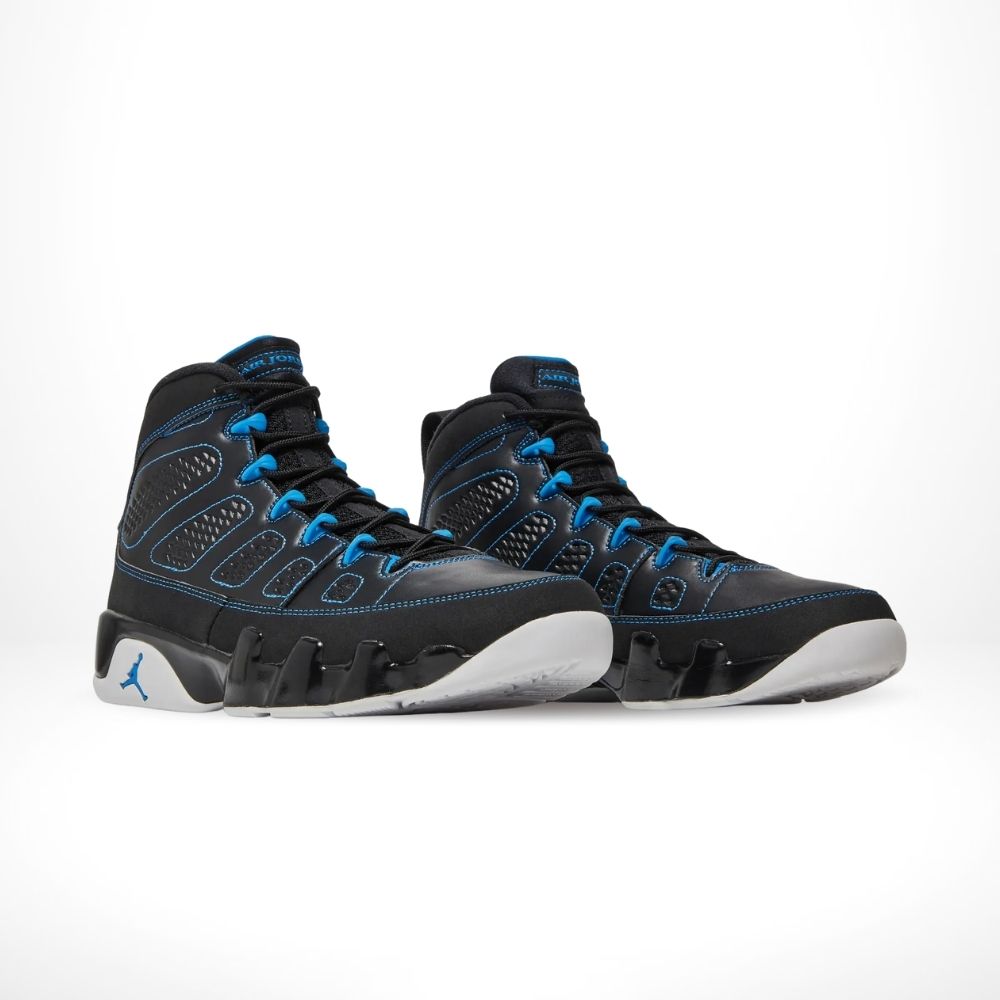 Angled front view of a full pair of Air Jordan 9